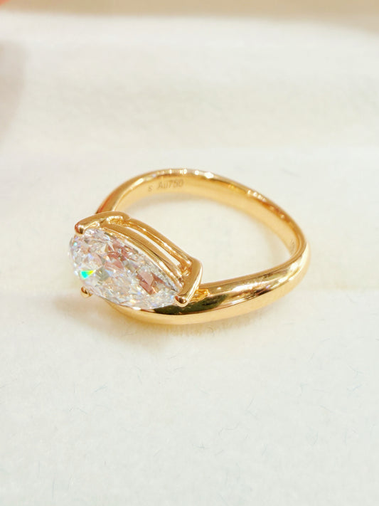 1 Carat D VVS2 Pear Cut Diamond | East-West Bypass Setting | 18K Yellow Gold Ring