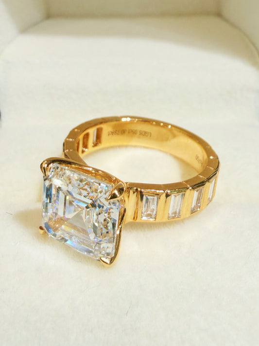 5.05-carat Asscher Cut Diamond Solitaire Ring with Channel-Set Baguette Band | 18K Yellow Gold